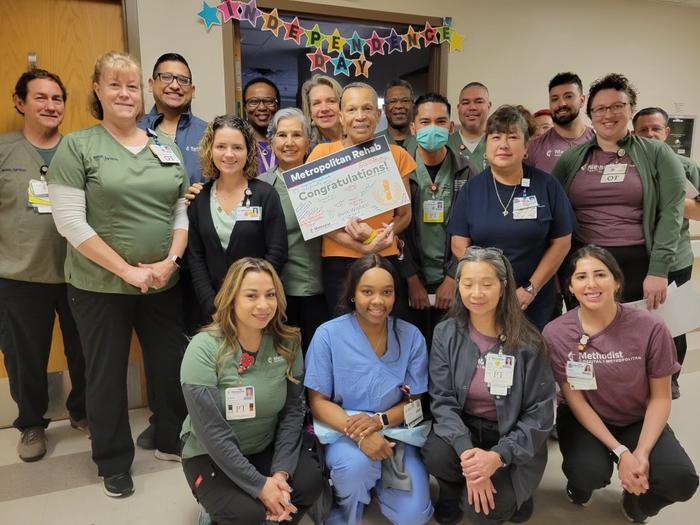 Claudette Dunnaway on her last day in hospital with Methodist Healthcare team members.