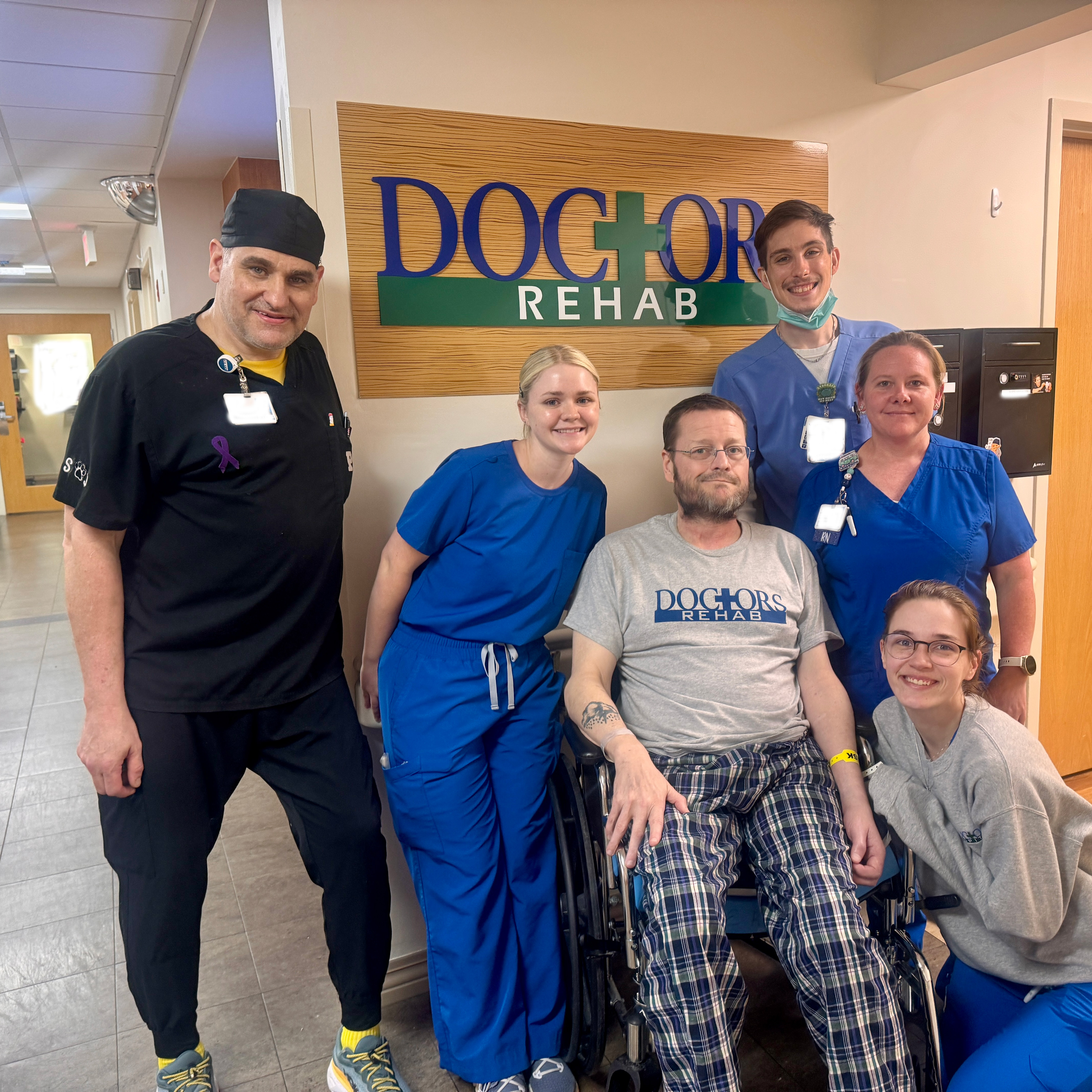 Adam Cook with care team at Doctors Hospital Rehab.