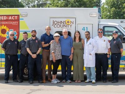 Elizabeth White with EMS team, care team and Dr. Kulhari.