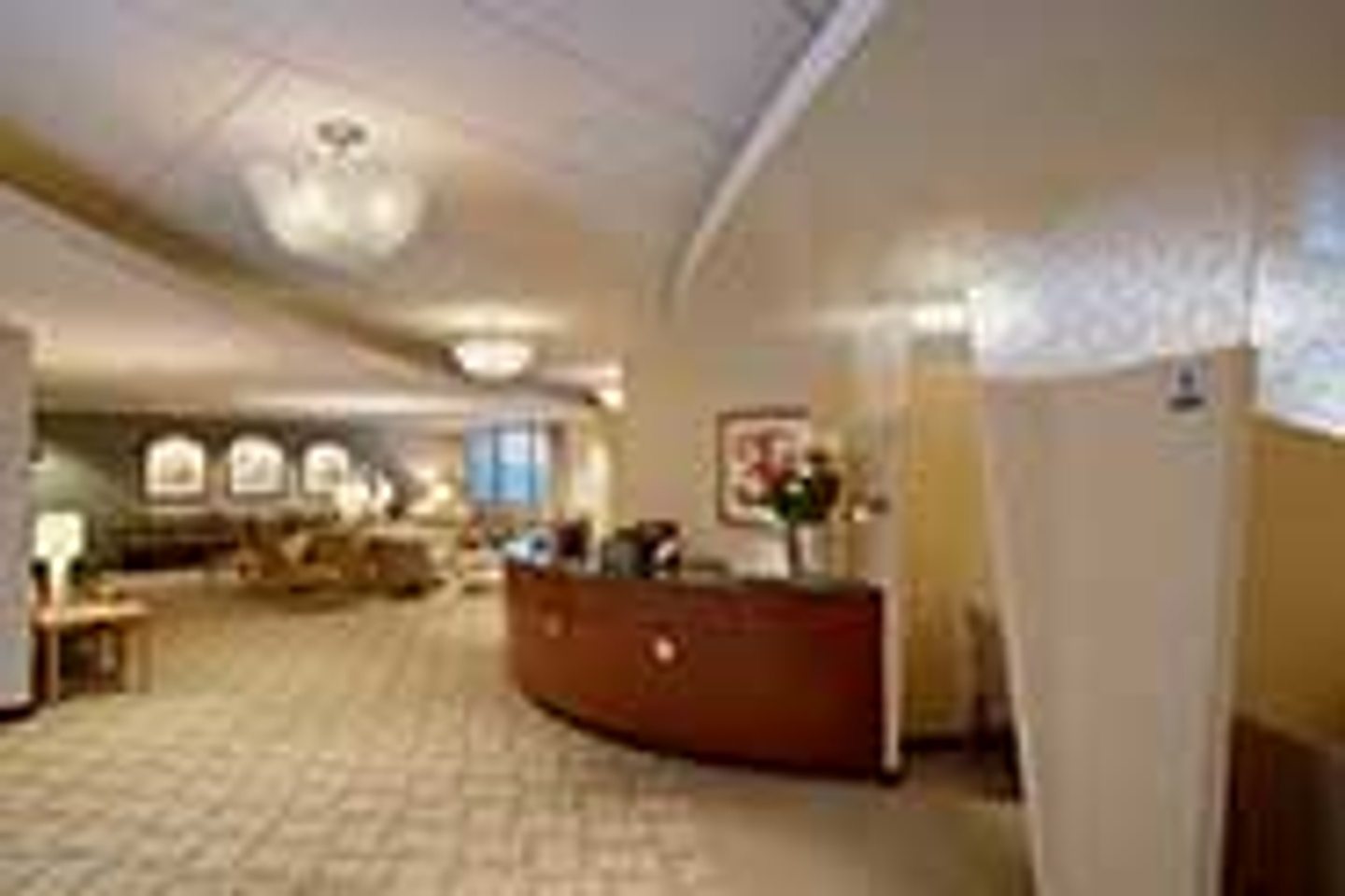 Interview lobby of Reston Hospital Center, showing a patient waiting room with chairs and a nurses station.