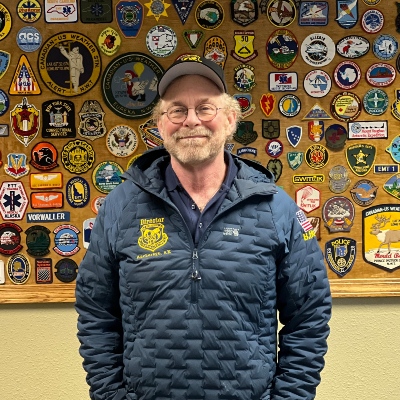 Brian Horner smiling and wearing a puffer jacket.