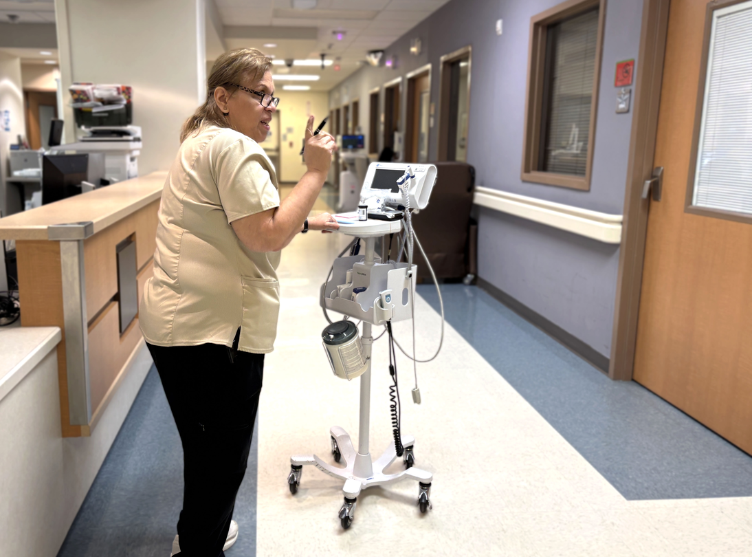 Lisa Rodriguez at work in the hallways at Methodist Hospital Texsan