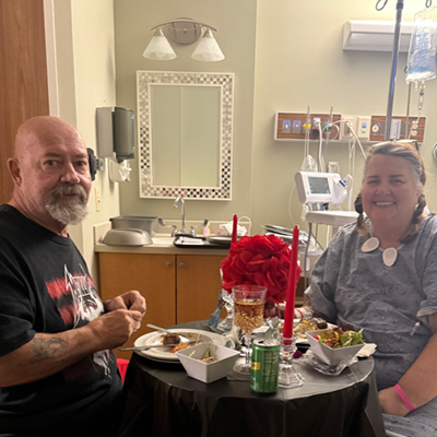 Couple enjoys anniversary meal in the hospital.