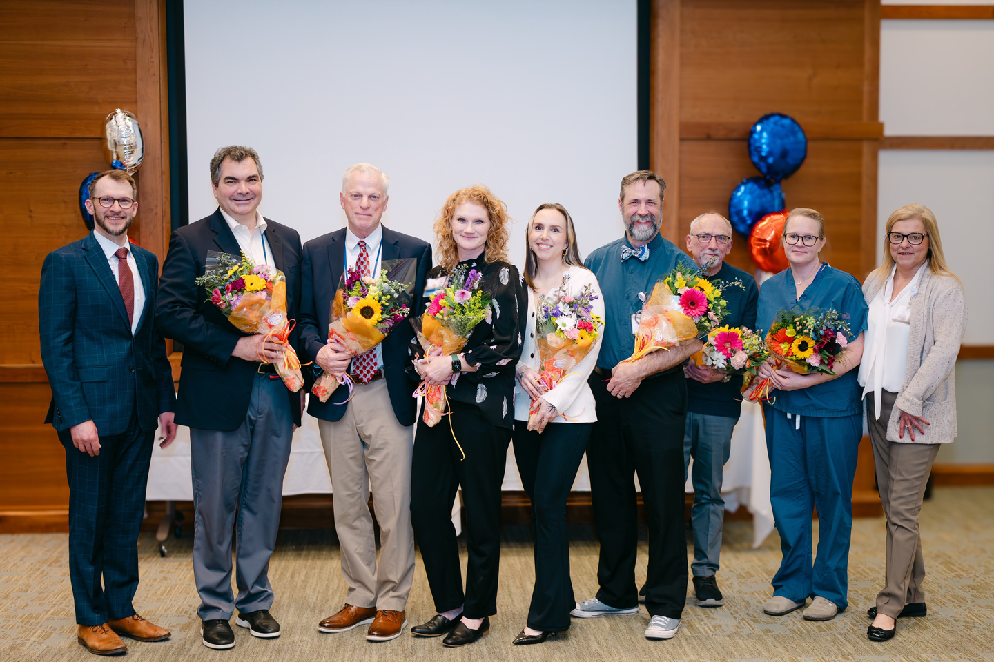 Award winners pose with the CEO and chief nursing officer.