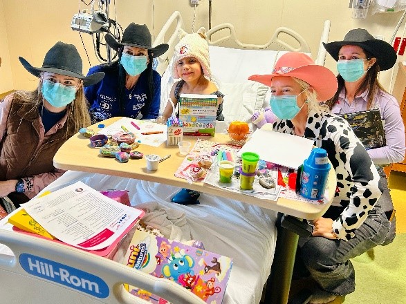 Rodeo champions spend time visiting with patients at Methodist Children's Hospital.