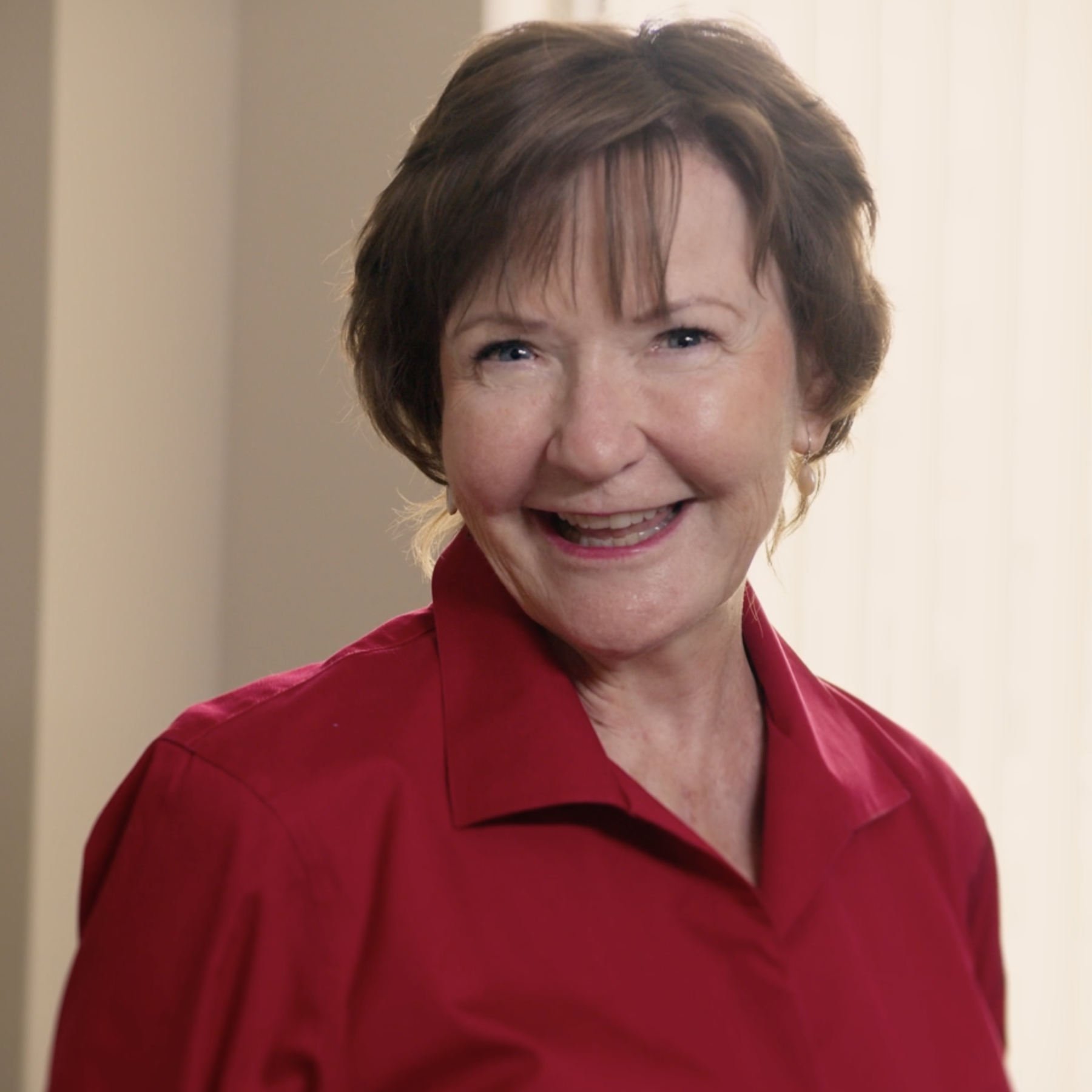 Life threatening cardiac surgery survivor Marlene Kramer smiling and posing for a picture.