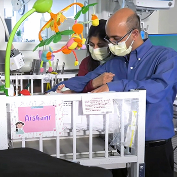 Praveena and Kapil visiting their daughter Aishani in the Good Samaritan Hospital NICU.