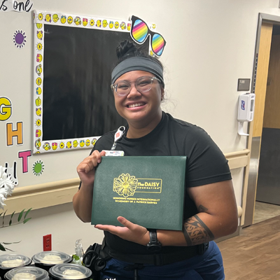 Lady Siagian with her DAISY Award. 