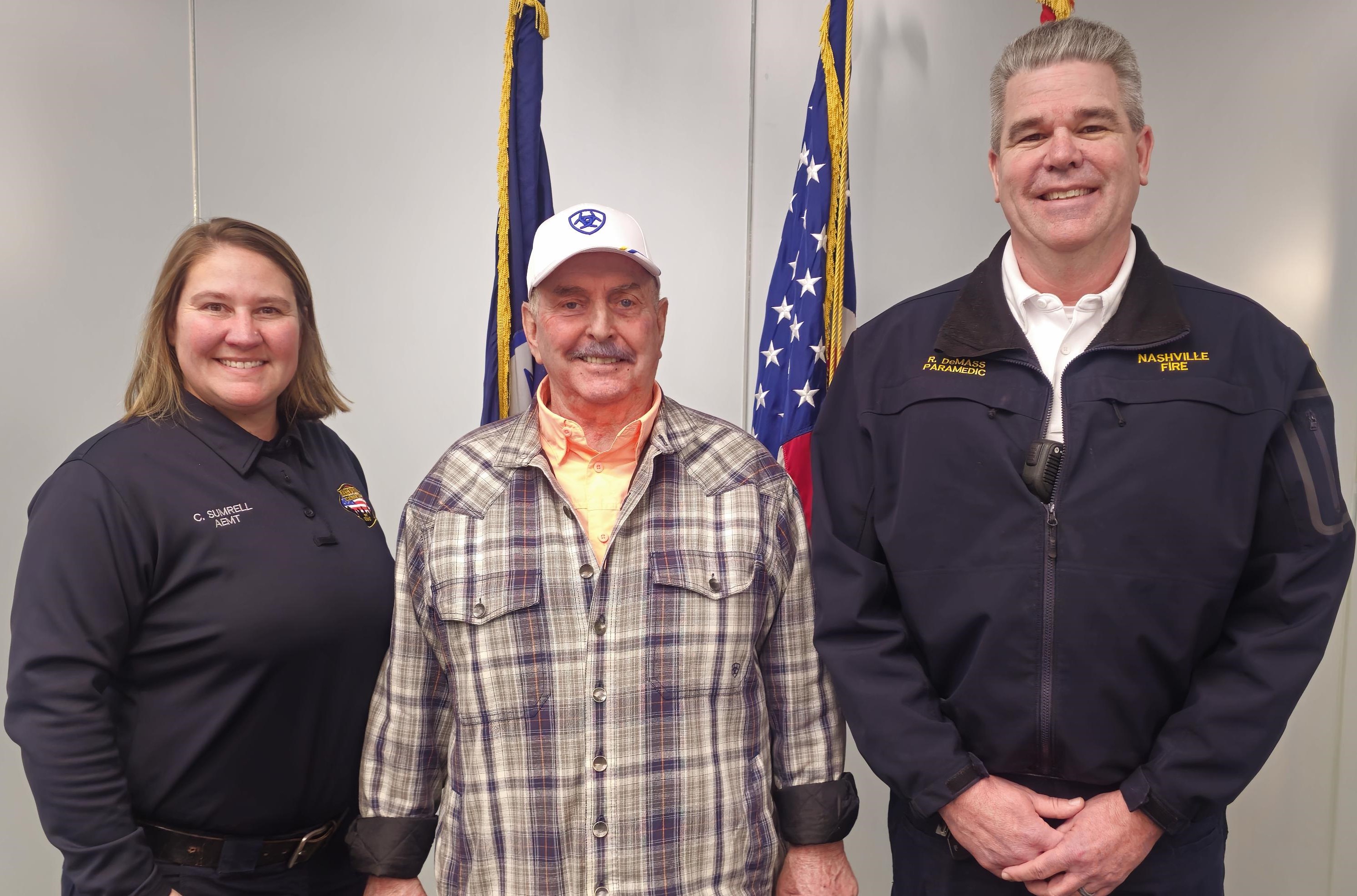 Pictured is patient Neil Mitchell with Nashville Fire Department's Madison Station crew AEMT Carrie Sumrell and Paramedic Robert DeMass who he credits with helping to save his life after a STEMI heart attack.