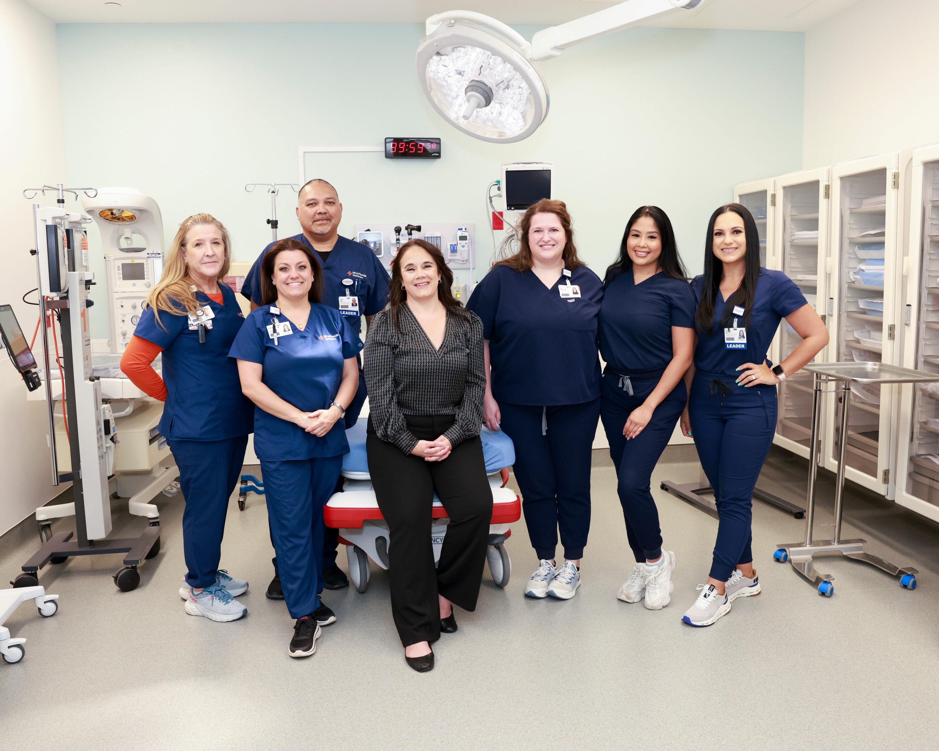 HCA Florida South Shore Hospital CEO Cathy Edmisten (second from left) and Apollo Beach Emergency team in the new facility’s CT Scan room