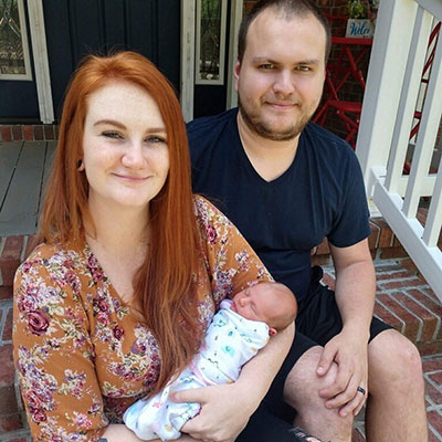  New mother Charlie with her husband and newborn child