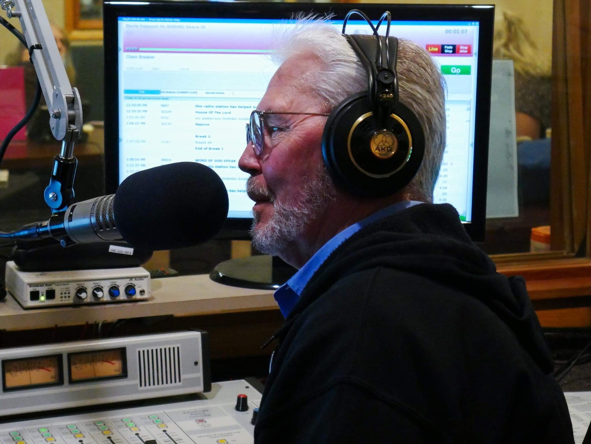 Ricky Bybee at the mic hosting a radio show.