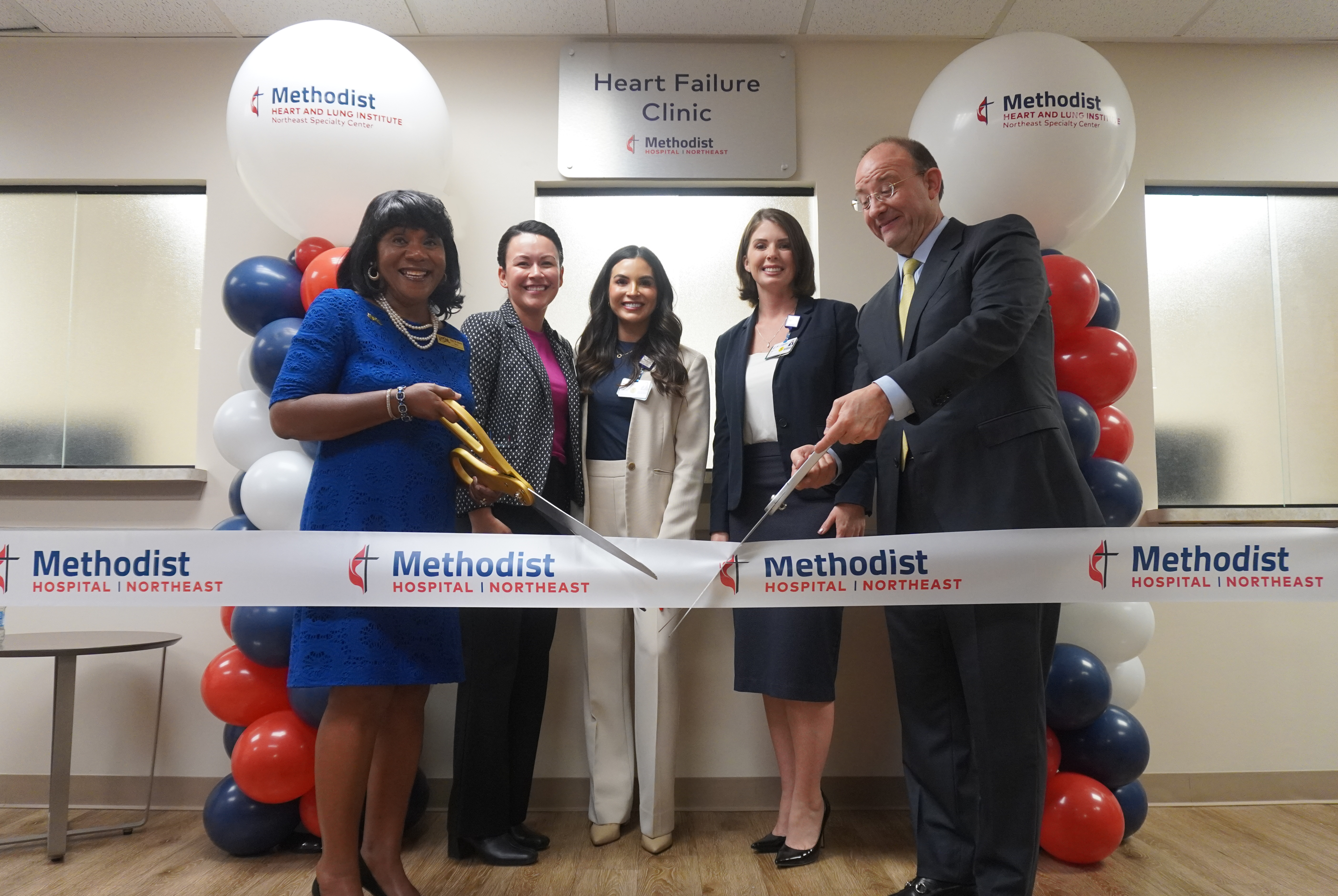 Methodist Hospital Northeast leaders cut a ribbon to celebrate the opening of the new Methodist Heart and Lung Institute Northeast Specialty Center.