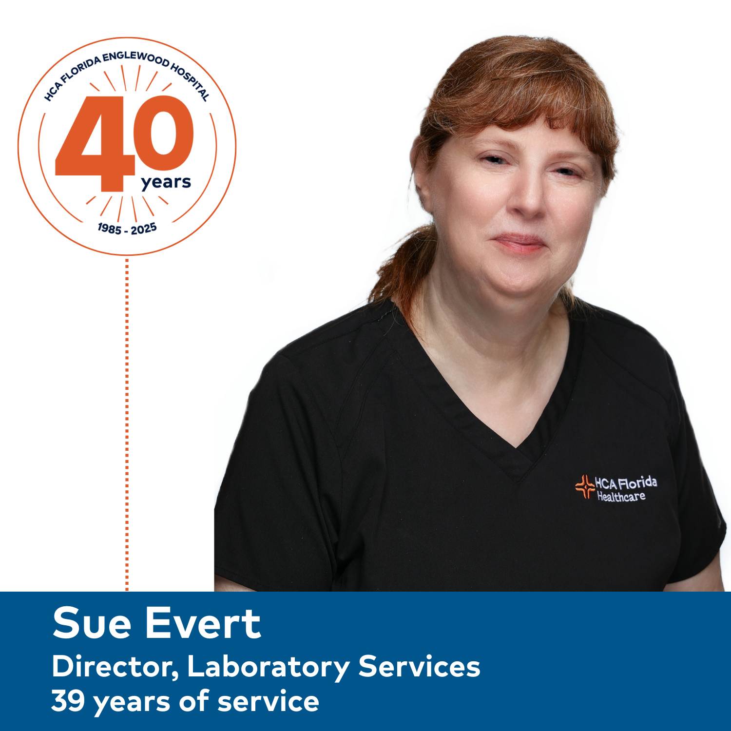 Image of a woman with red hair dressed in black scrubs. 40 years of service is featured in a circle logo. Her name is listed as Sue Evert, Director Laboratory Services, 39 years of service in a blue bar across the bottom of the image.