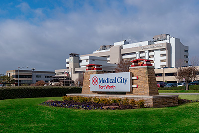 Medical City Fort Worth Hospital exterior photo as seen from a sign