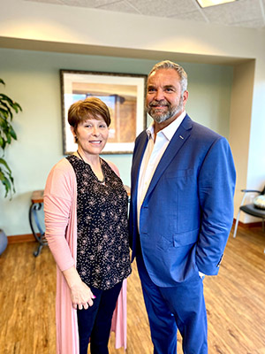 Diane Ferguson stands with Dr. Kade Huntsman