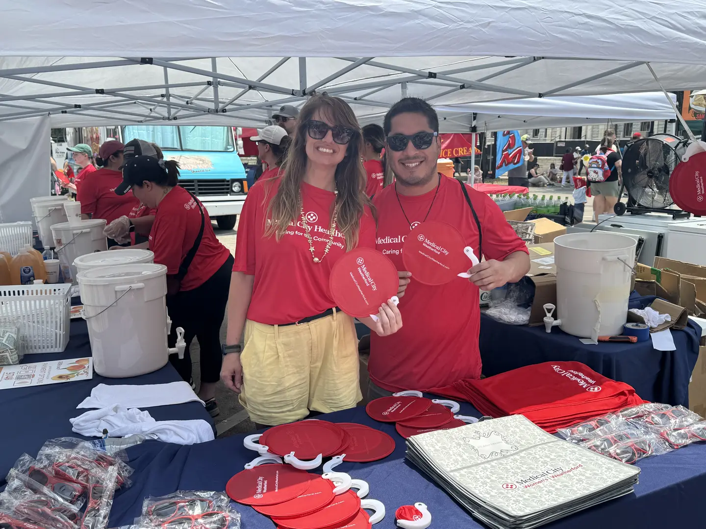 Medical City Weatherford colleagues volunteer during the 2025 Parker County Peach Festival.
