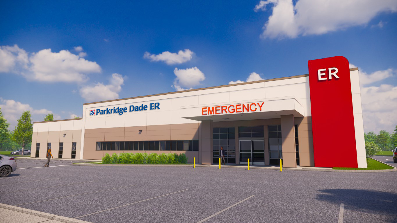 Digital Rendering of Parkridge Dade Emergency Entrance. Tan and white two story buiding with a bright red vertical stripe at the corner of the building.