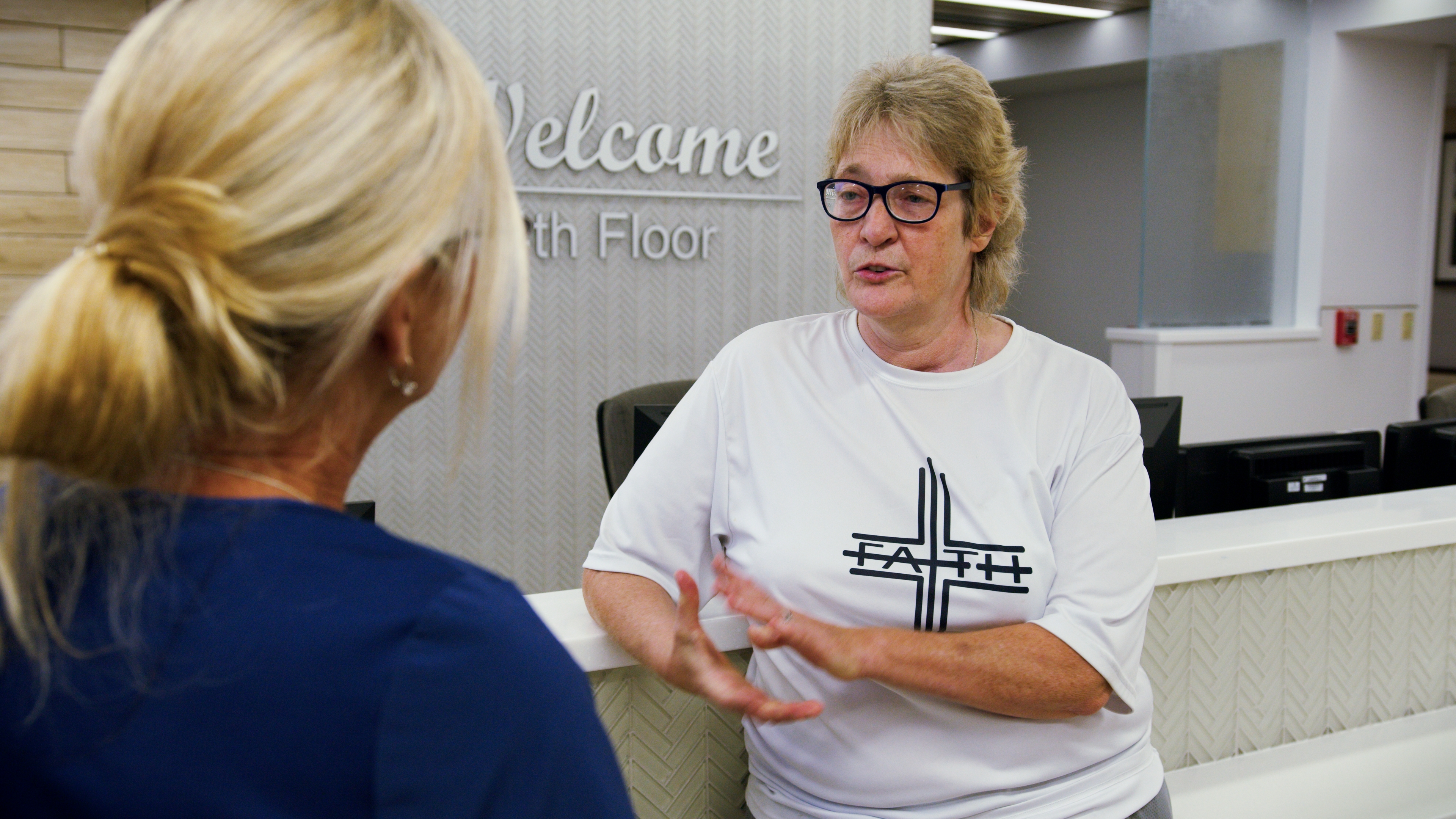 Yvette visits with a nurse who cared for her when she was a patient at the hospital.