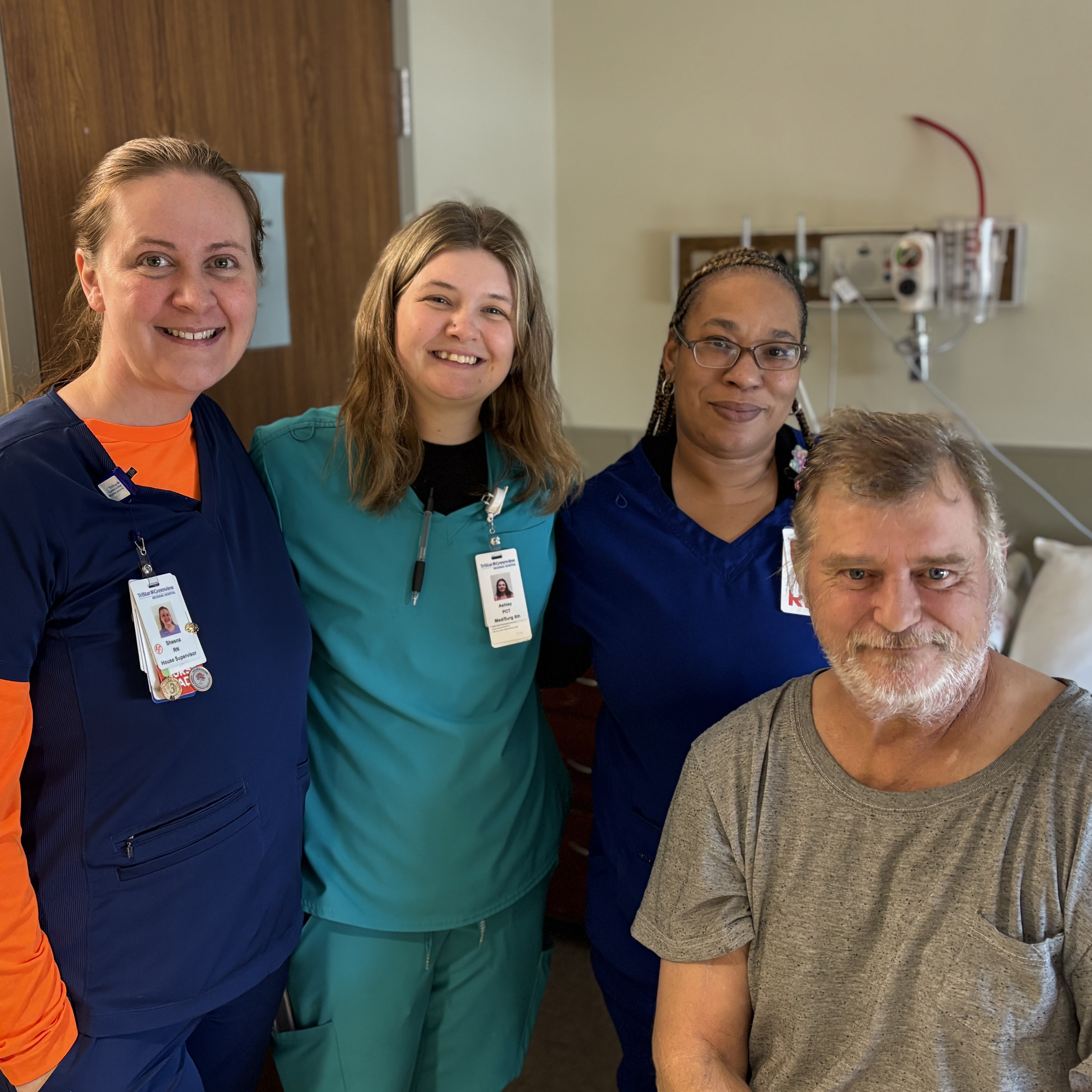 Photo of Rollie and his care team.