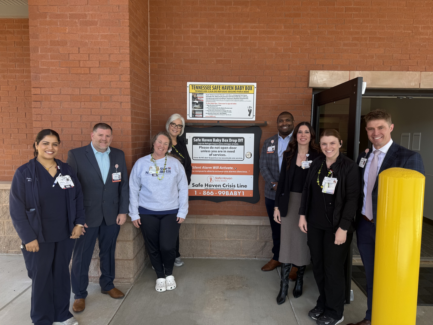TriStar Nolensville ER colleagues standing in front of the&nbsp;Safe&nbsp;Haven&nbsp;Baby Box