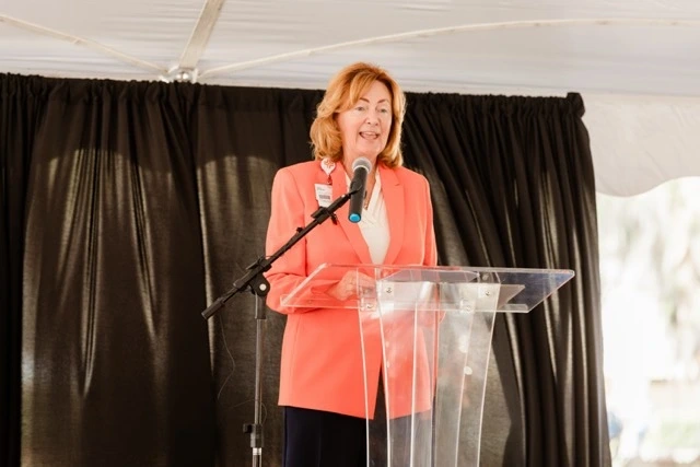 HCA Florida Citrus Hospital CEO Lisa Nummi addresses crowd at a podium