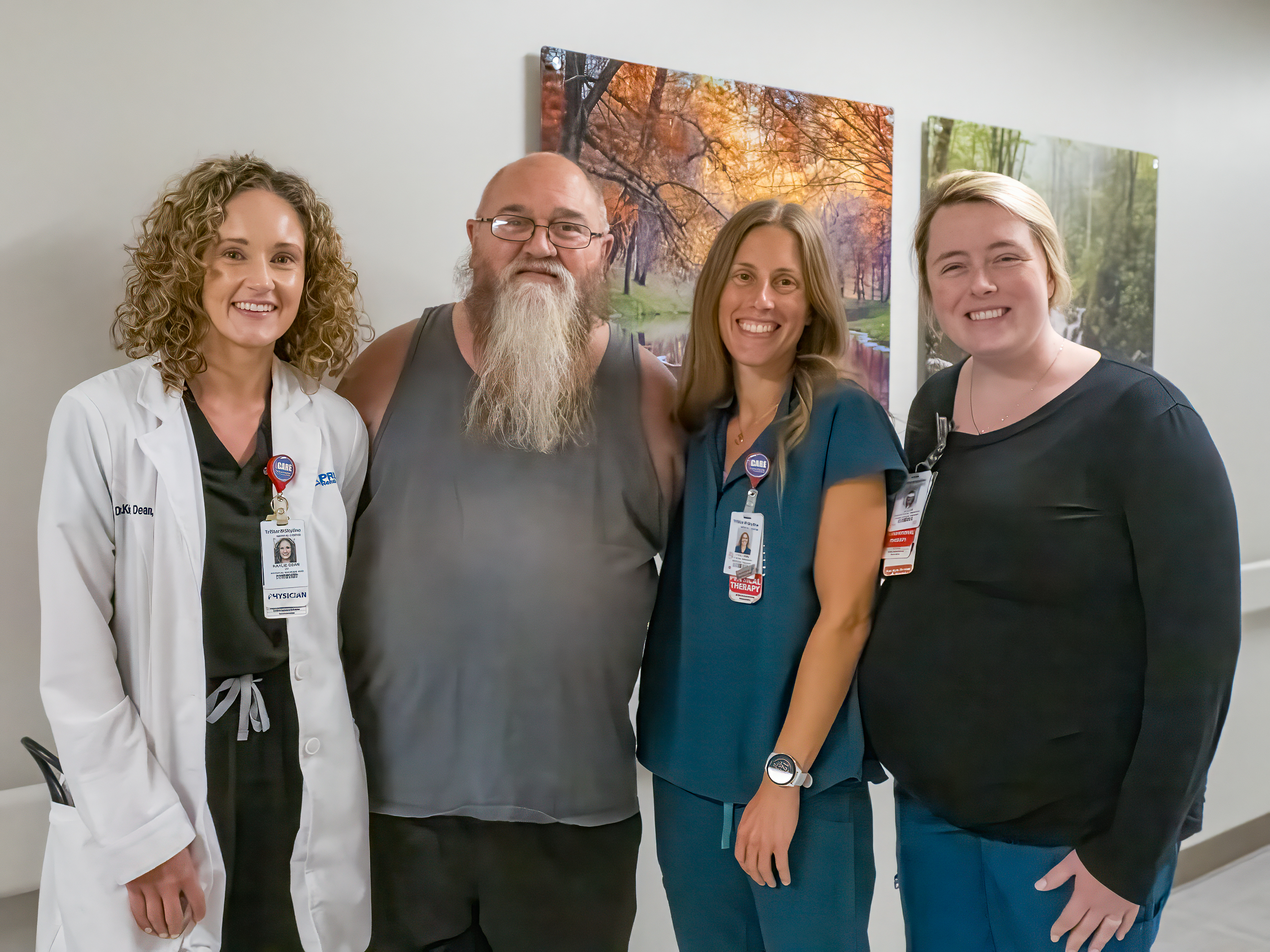 Richard Thames and his care team, including two of his therapists and Dr. Dean from the inpatient rehab unit.