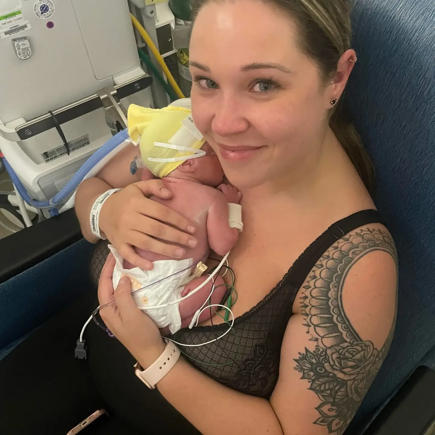 Stephanie Wasson holding NICU twin baby Rosie