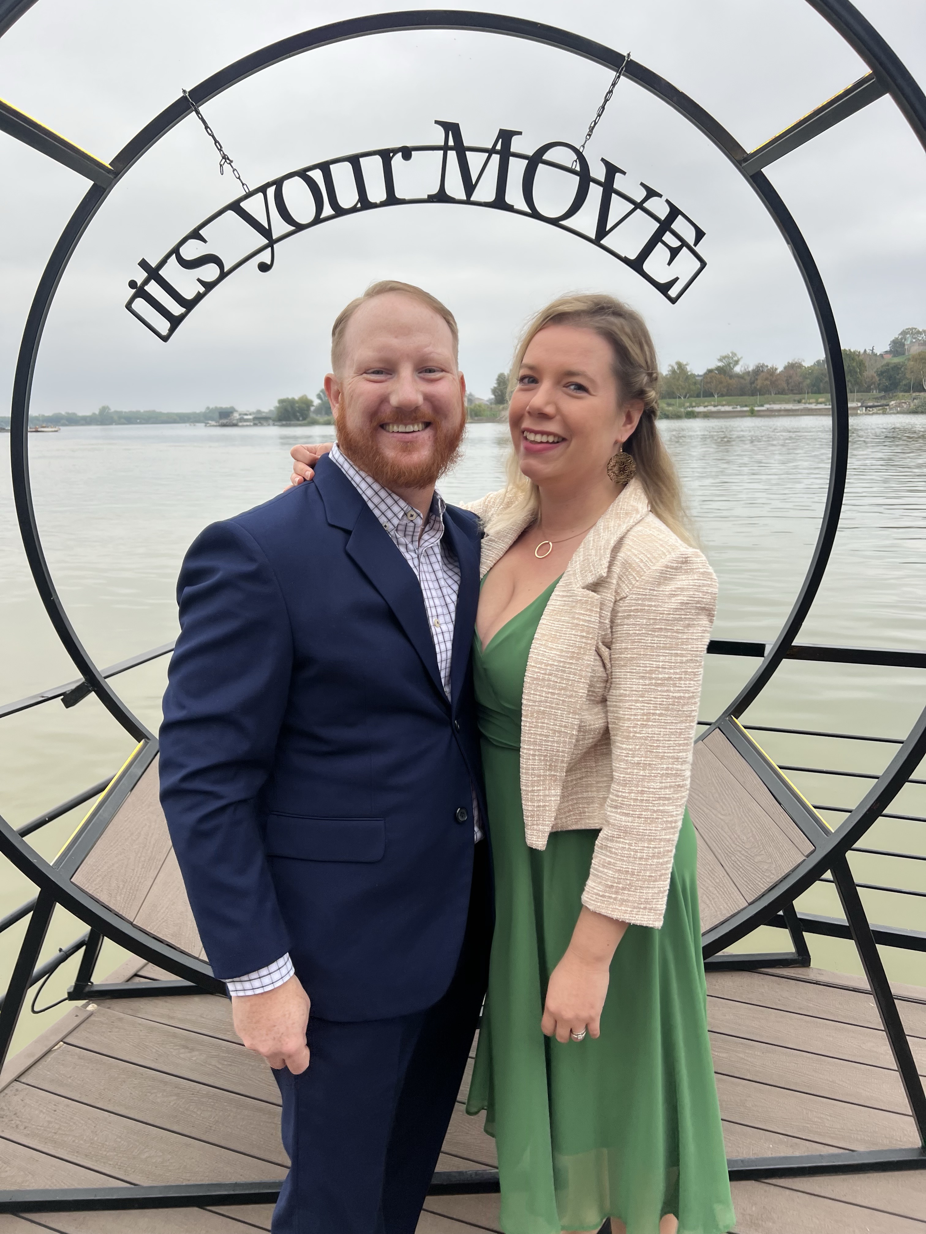 Devon Henry and Wife dressed up by the lakeside.