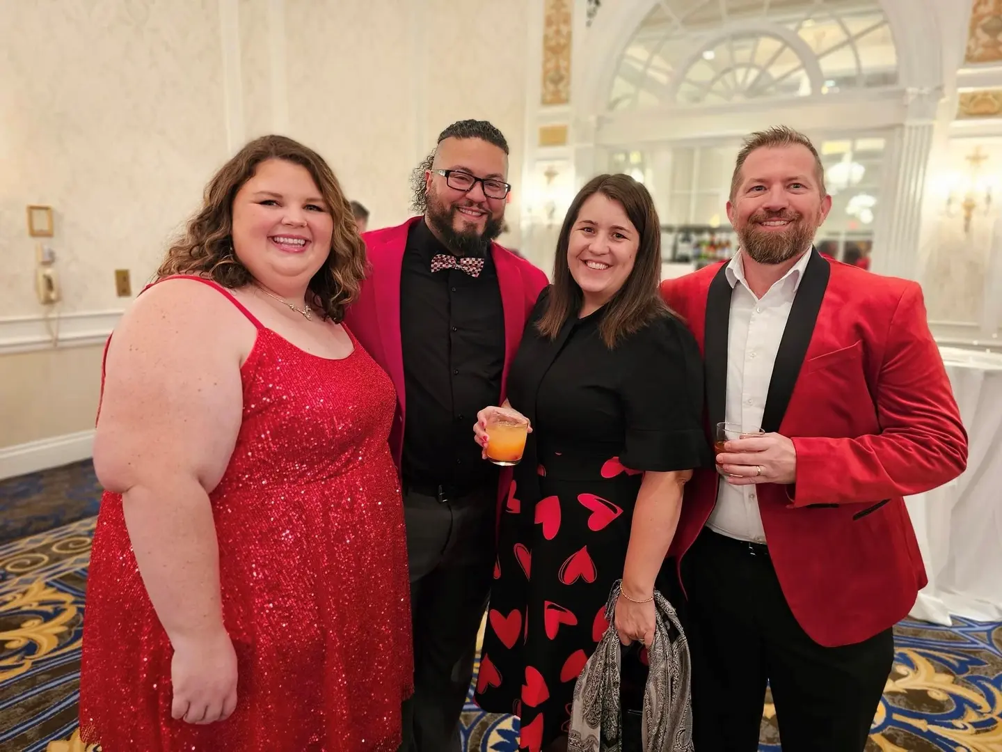 Amanda Taylor red and black matching group photo
