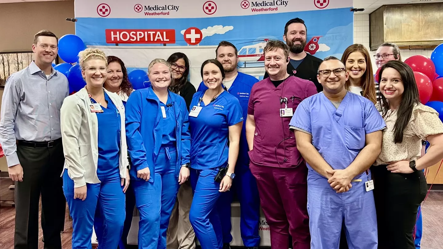 Colleagues at Medical City Weatherford Pose for a photo to celebrate their Level III Trauma Designation
