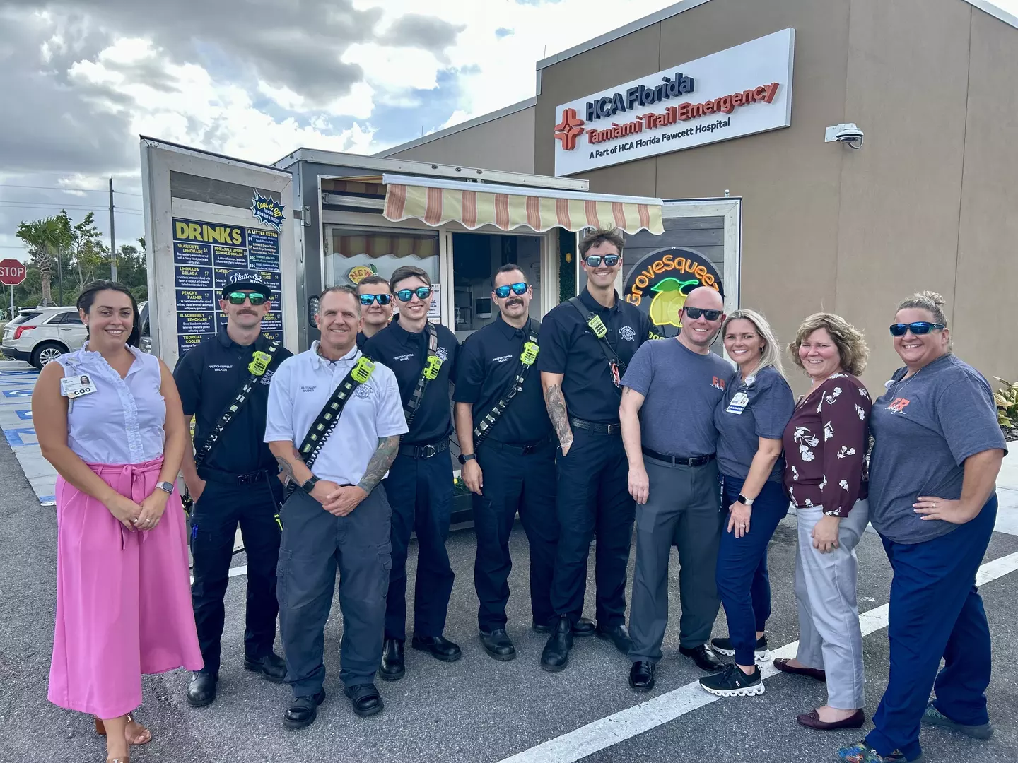 HCA colleagues celebrate 1yr anniversary of facility opening with ER and EMS staff.