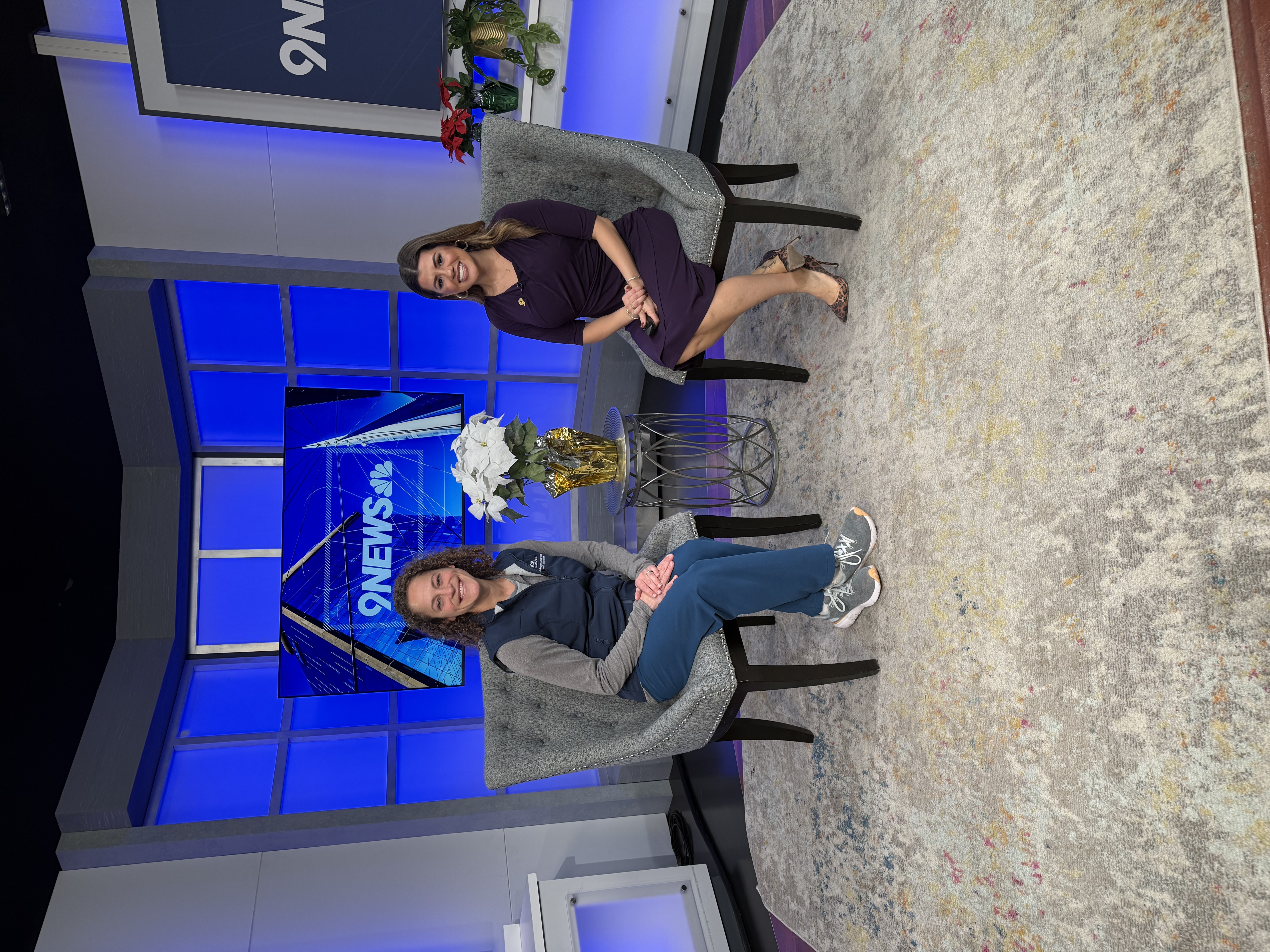 Dr. Danielle Dhaliwal on set with a host of NBC 9News.