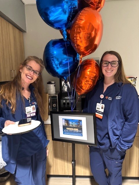 Two Hospital for Endocrine Surgery team members with celebration balloons.