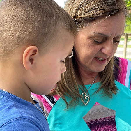 Kathy and her grandson.
