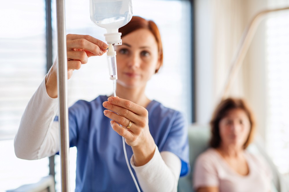 Nurse preparing IV drip