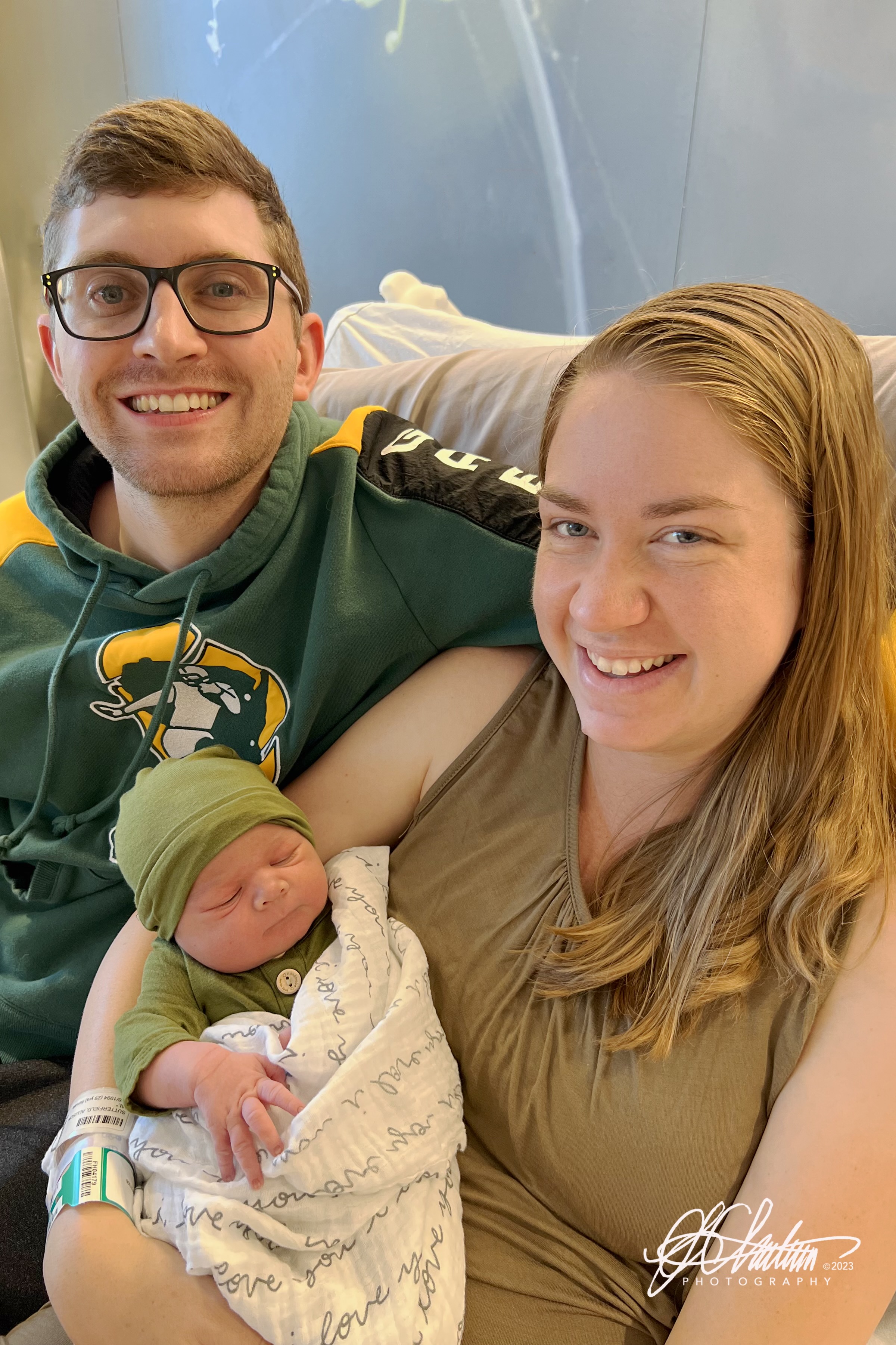 Alli and Andrew Sutterfiel with Alijah