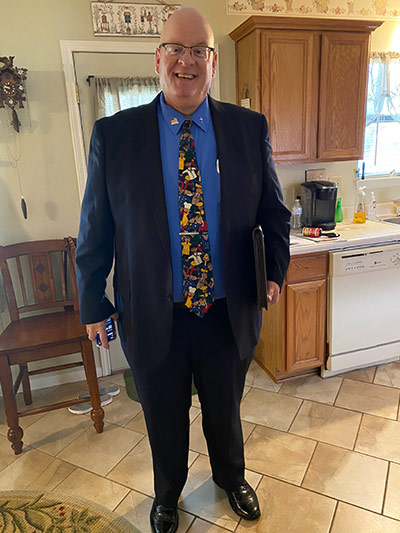 Michael Fuller wearing a suit.