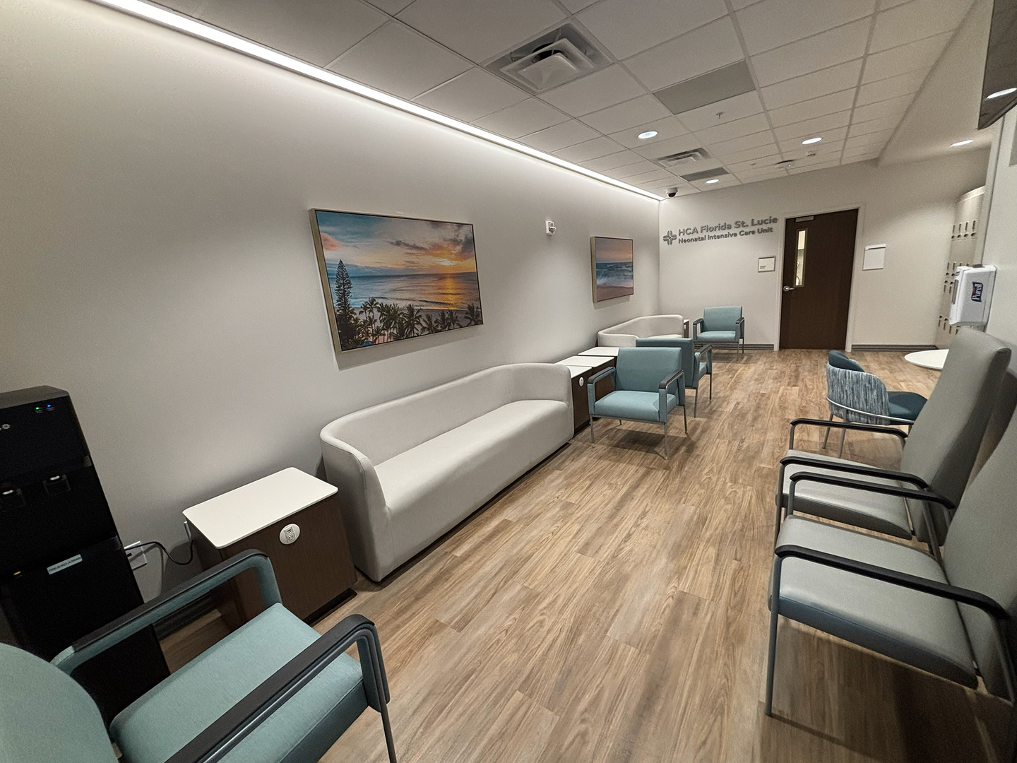 Family Room at St. Lucie Hospital labor and delivery unit, with several lounge chairs and sofa.