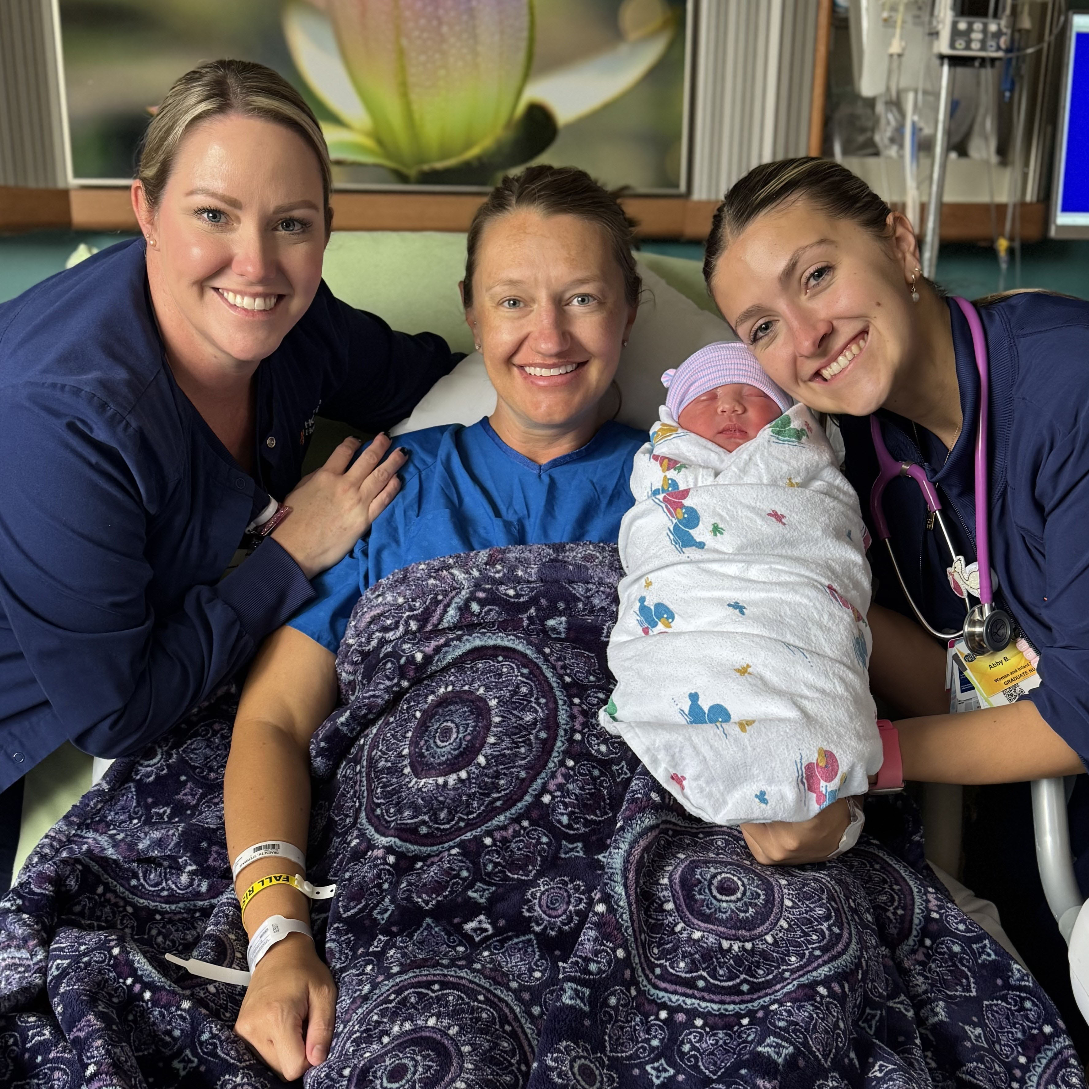 Stephanie, Abby and Carrie gather after baby, Corbin is born.
