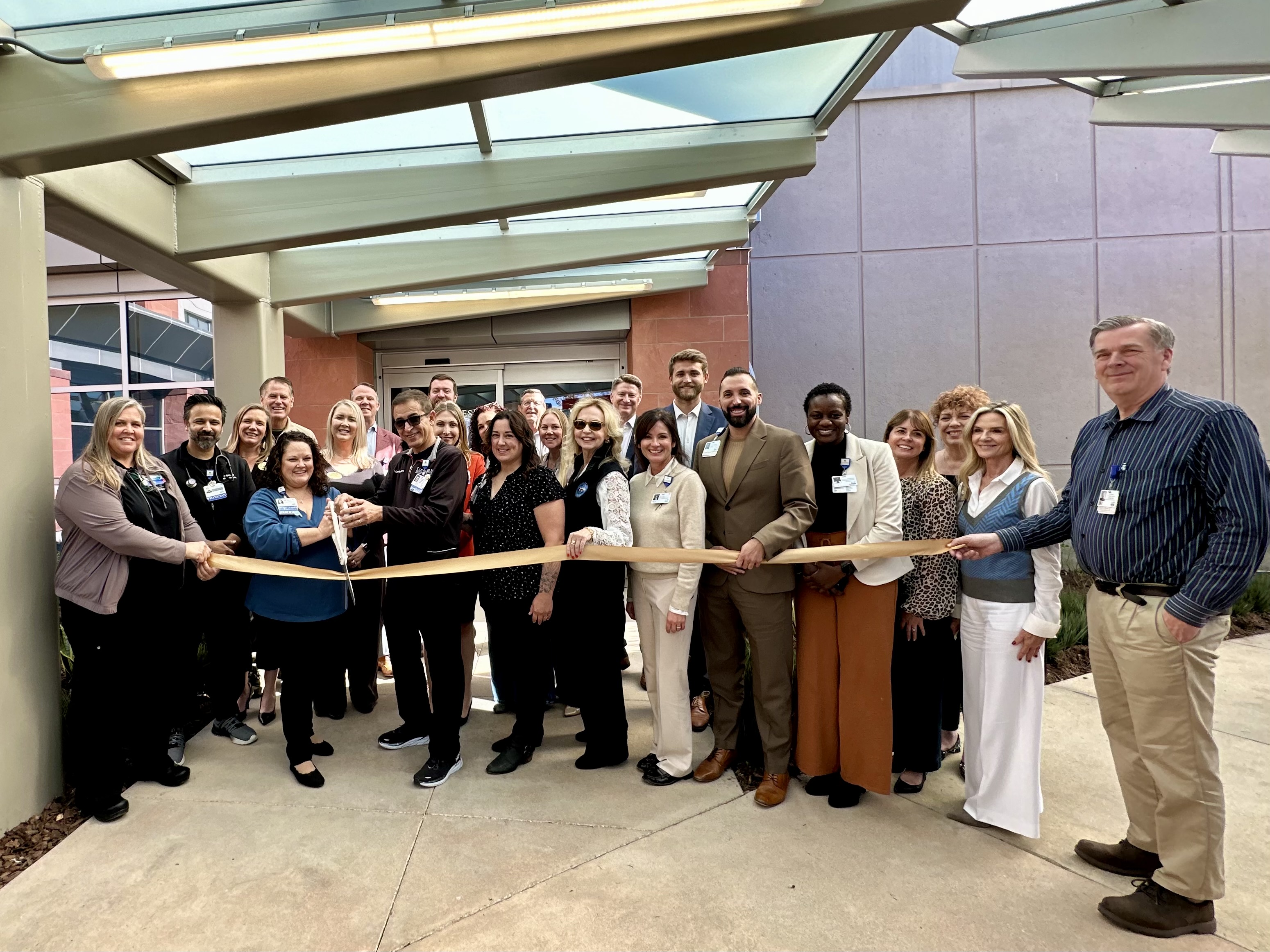 Los Robles team members at ribbon cutting ceremony in newly expanded emergency room lobby.