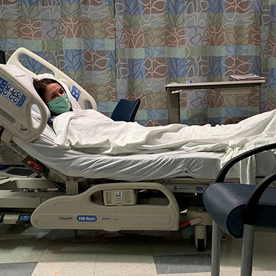 Samantha Garza in a hospital bed.