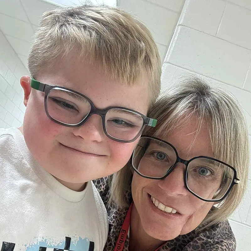 Lindsey with one of her students after returning to school after her injury