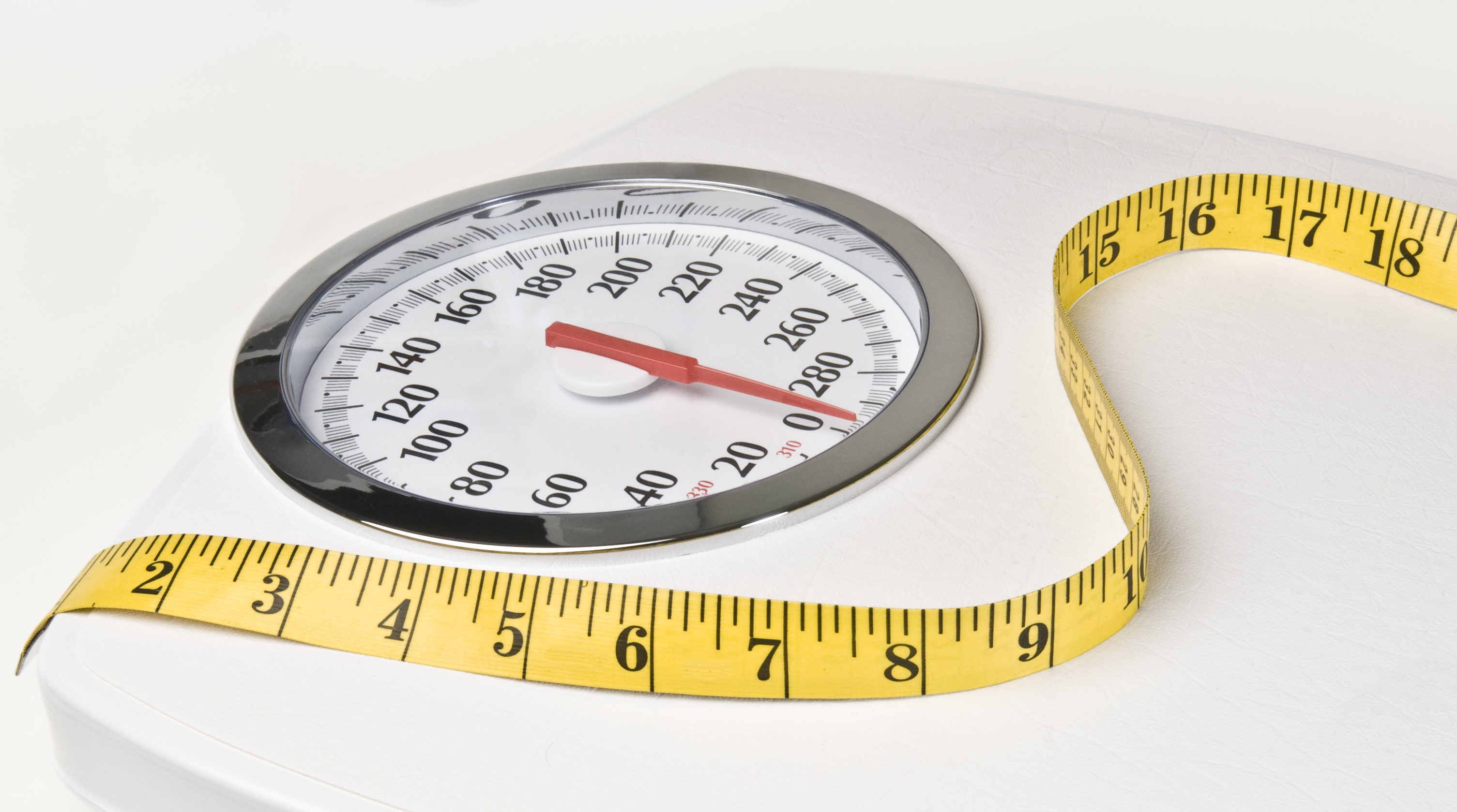 Bathroom scale with tape measure.