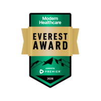 Green shield with an image of a mountain and text, "Modern Healthcare Everest Award, Powered by Premier, 2026"