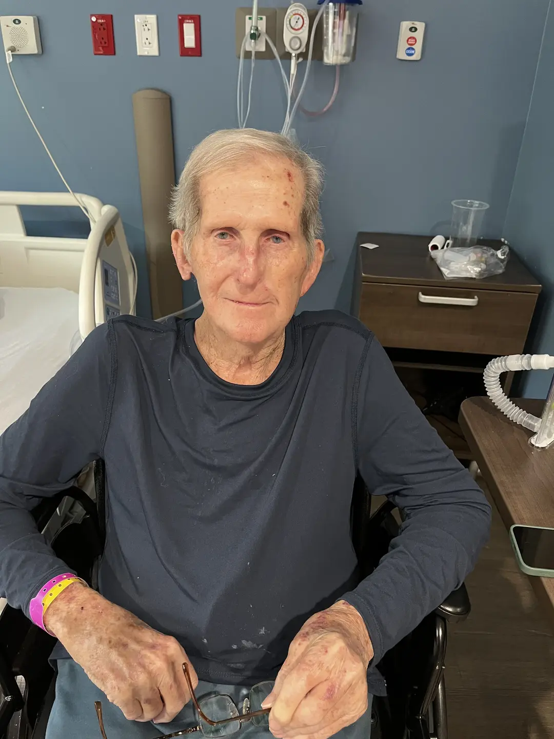 John Tepera sitting in hospital room