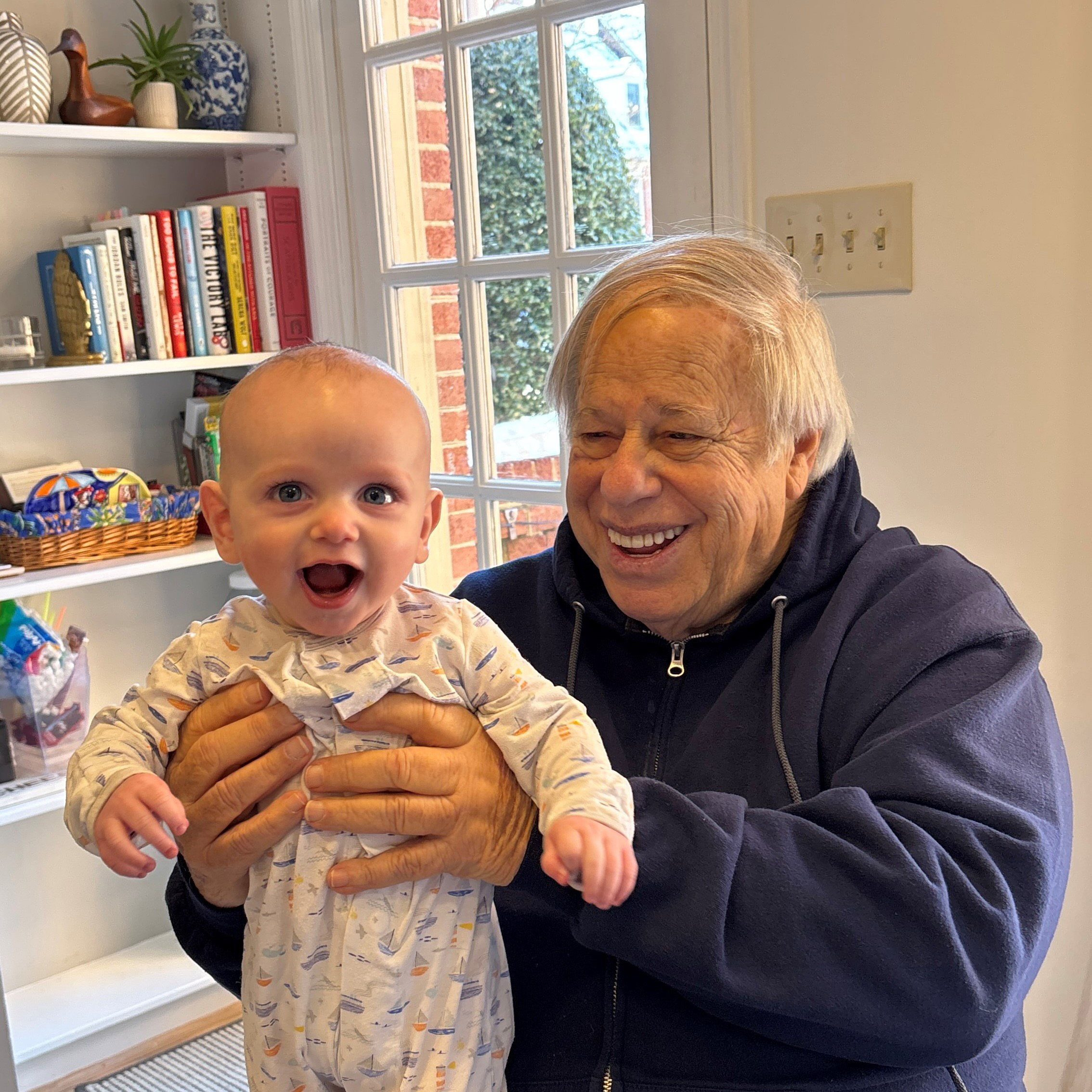 Glenn Kamber and grandson posing.