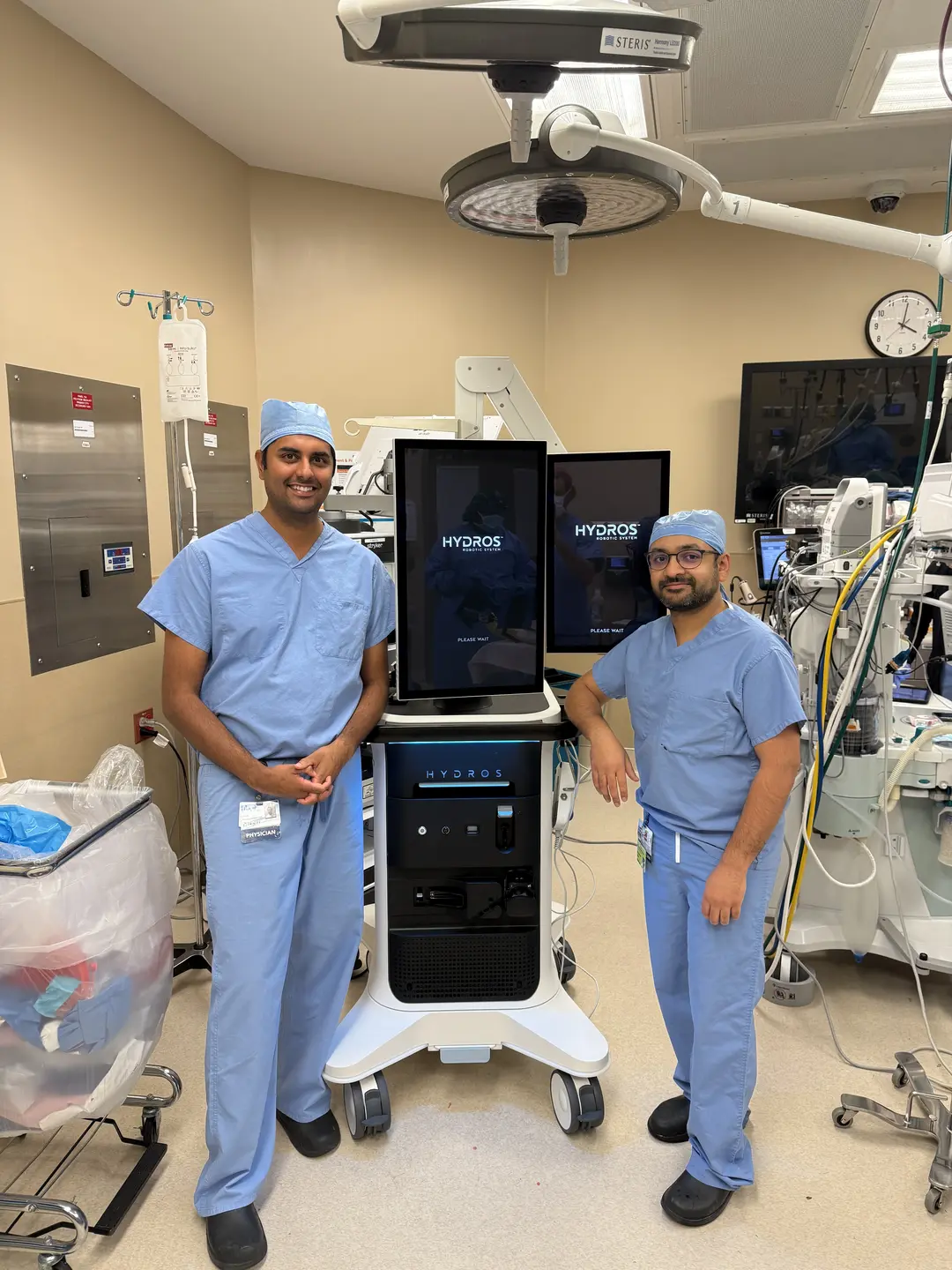 HCA Florida Trinity Hospital urologists – Dr. Amar Raval and Dr. Ali Syed with the AI technology.