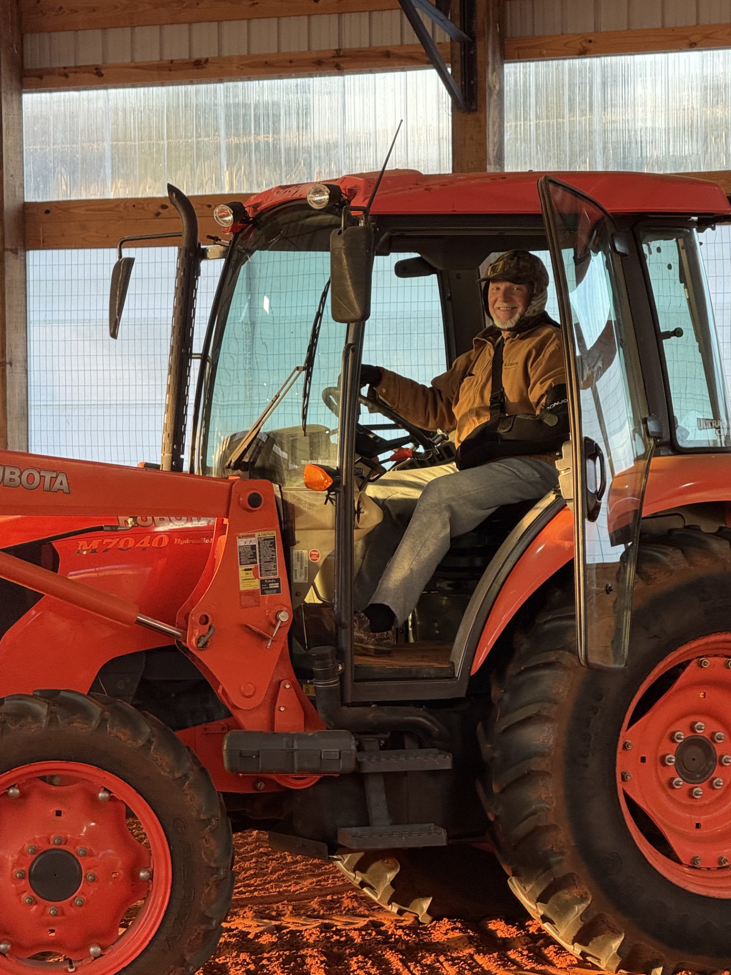Royce Hinson on a tractor.
