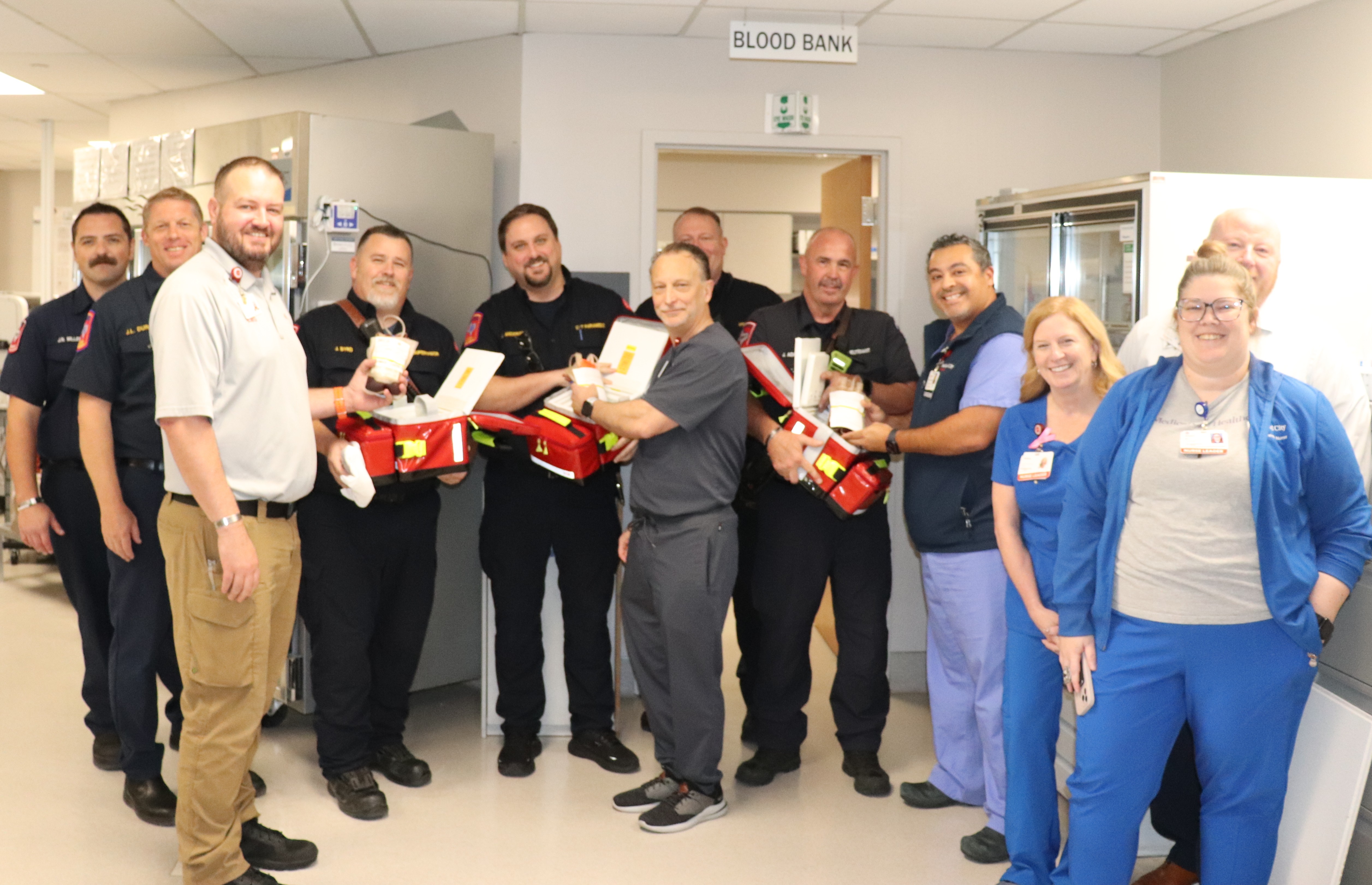 Medical City Arlington colleagues and EMS first responders with first units of blood to be administered in the field.